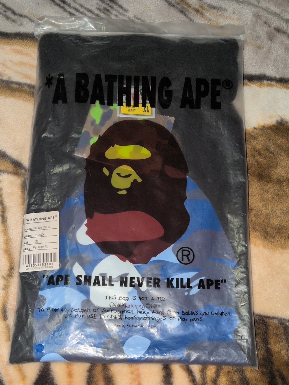 A Bathing Ape Men's Black Graphic Tee - Blue Camo Ape Logo